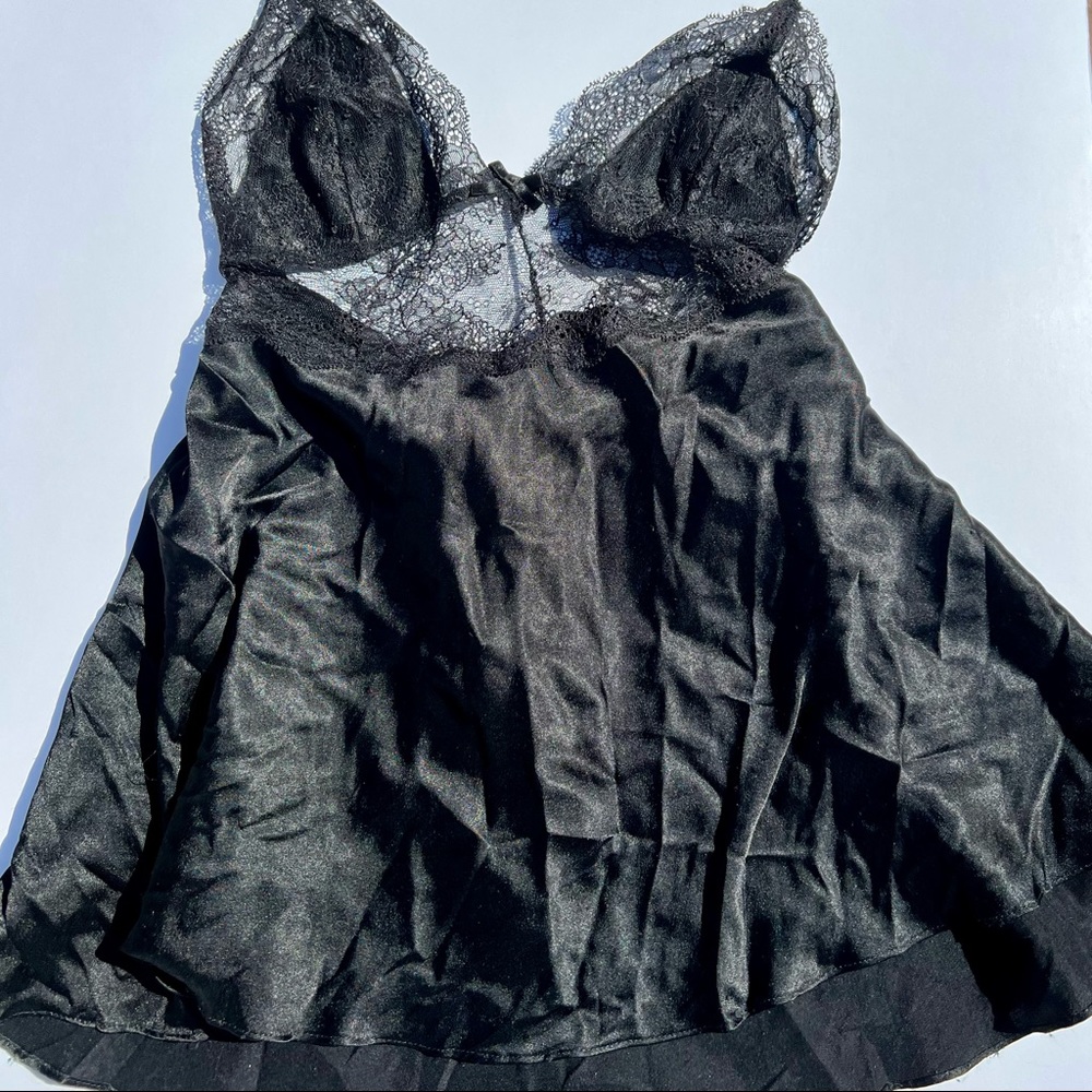 Victoria’s Secret black satin babydoll in size Small. Lace details,ties at waist
